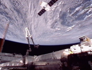 Illustration for article titled Watch Space X Dragon Make Its Historic ISS Dock Live (Updating)